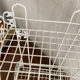 Corner shelf in openwork metal
