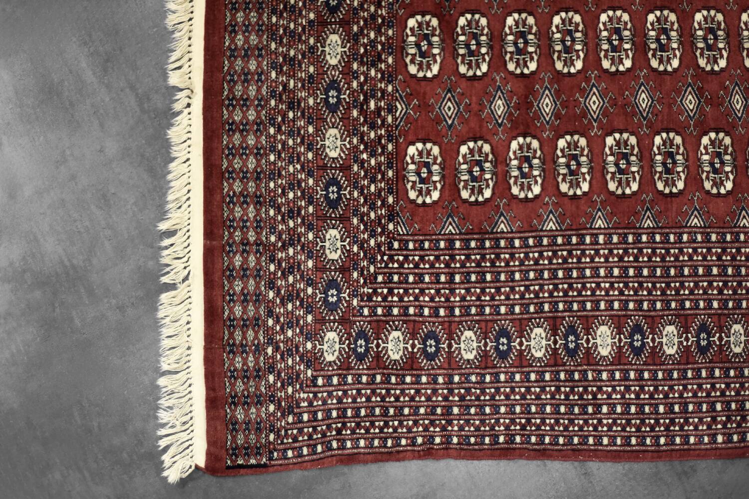 Handwoven red Boukhara oriental rug, 1960s