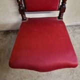 Chair known as a "chauffeuse" from the Napoléon III period, made of carved moulded wood.