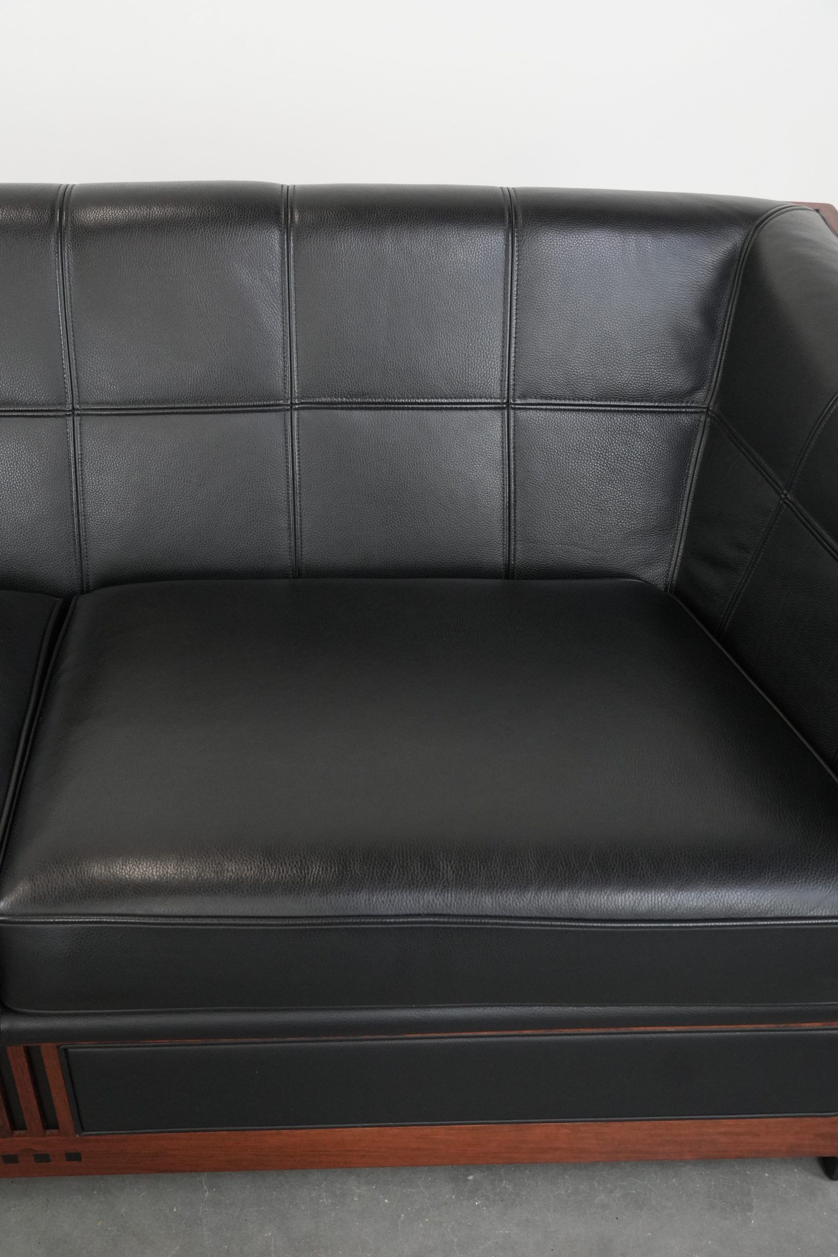 Art Deco  black leather 2.5-seater design sofa with beautiful woodwork