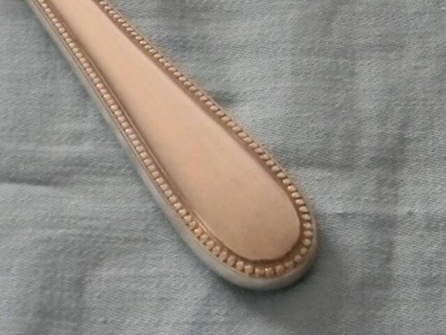 Set of 12 cheese or fruit knives with silver metal handles.