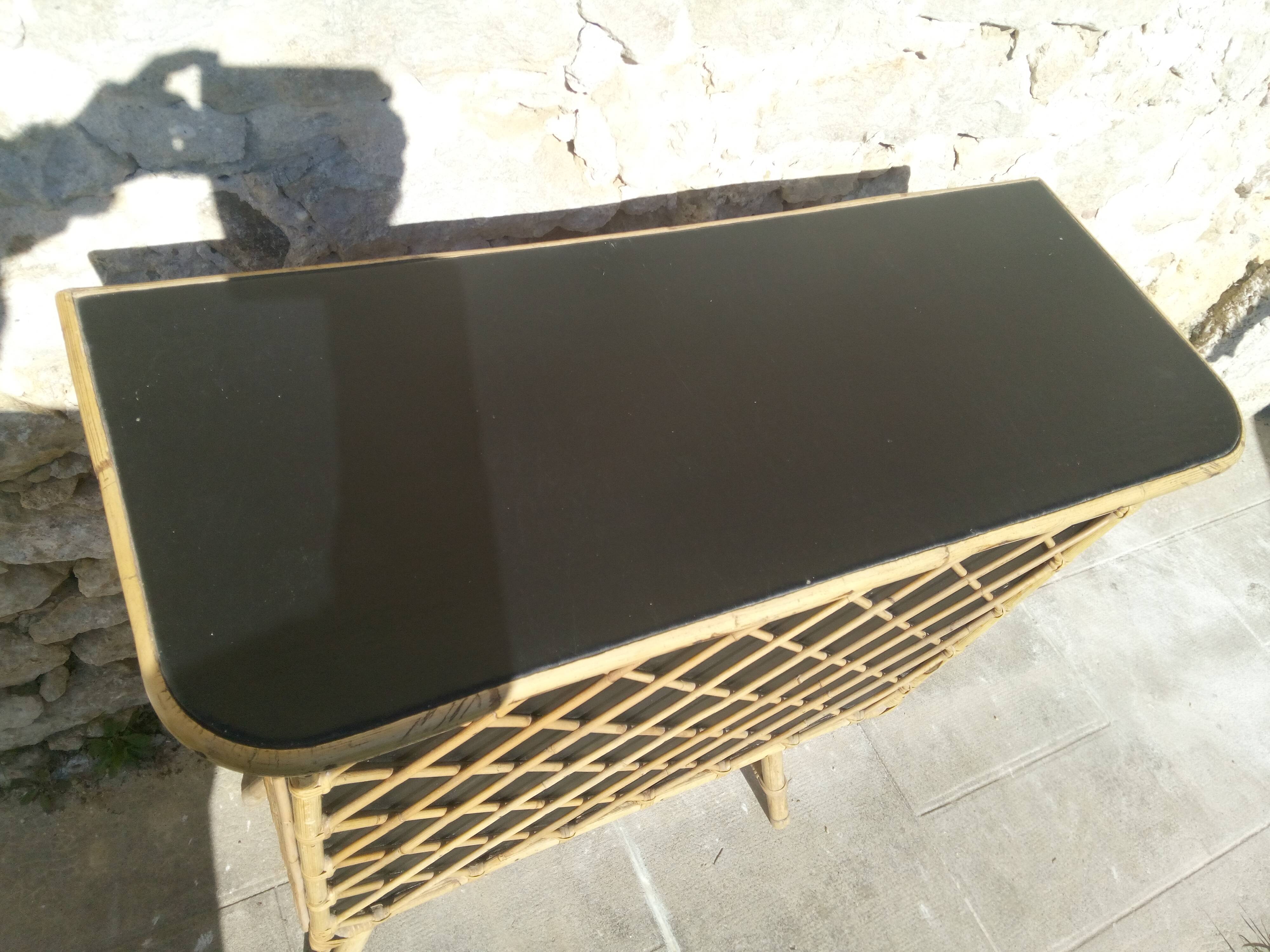 Bar in rattan, bamboo and faux black leather