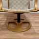 Swivel armchair and its ottoman in 1960s Scandinavian design.
