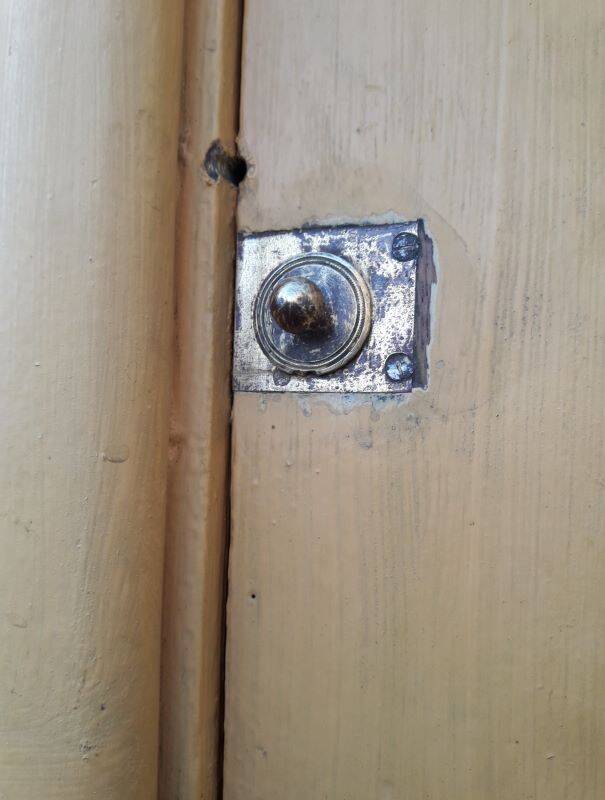 19th century double arched entrance door in oak with grilles and old glass