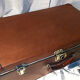Old vintage black and white cardboard storage suitcase travel