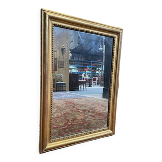 Miroir Louis XVI doré à la feuille d'or