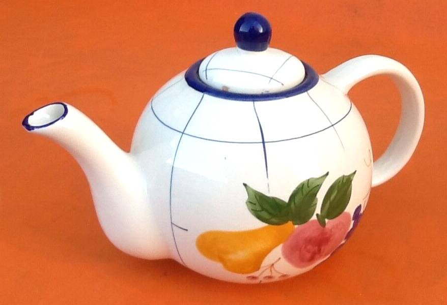 Coffee / teapot ball shape earthenware with fruit decoration