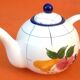 Coffee / teapot ball shape earthenware with fruit decoration
