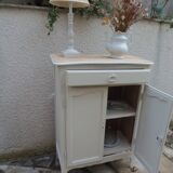 Small buffet, reimagined storage unit in beige.