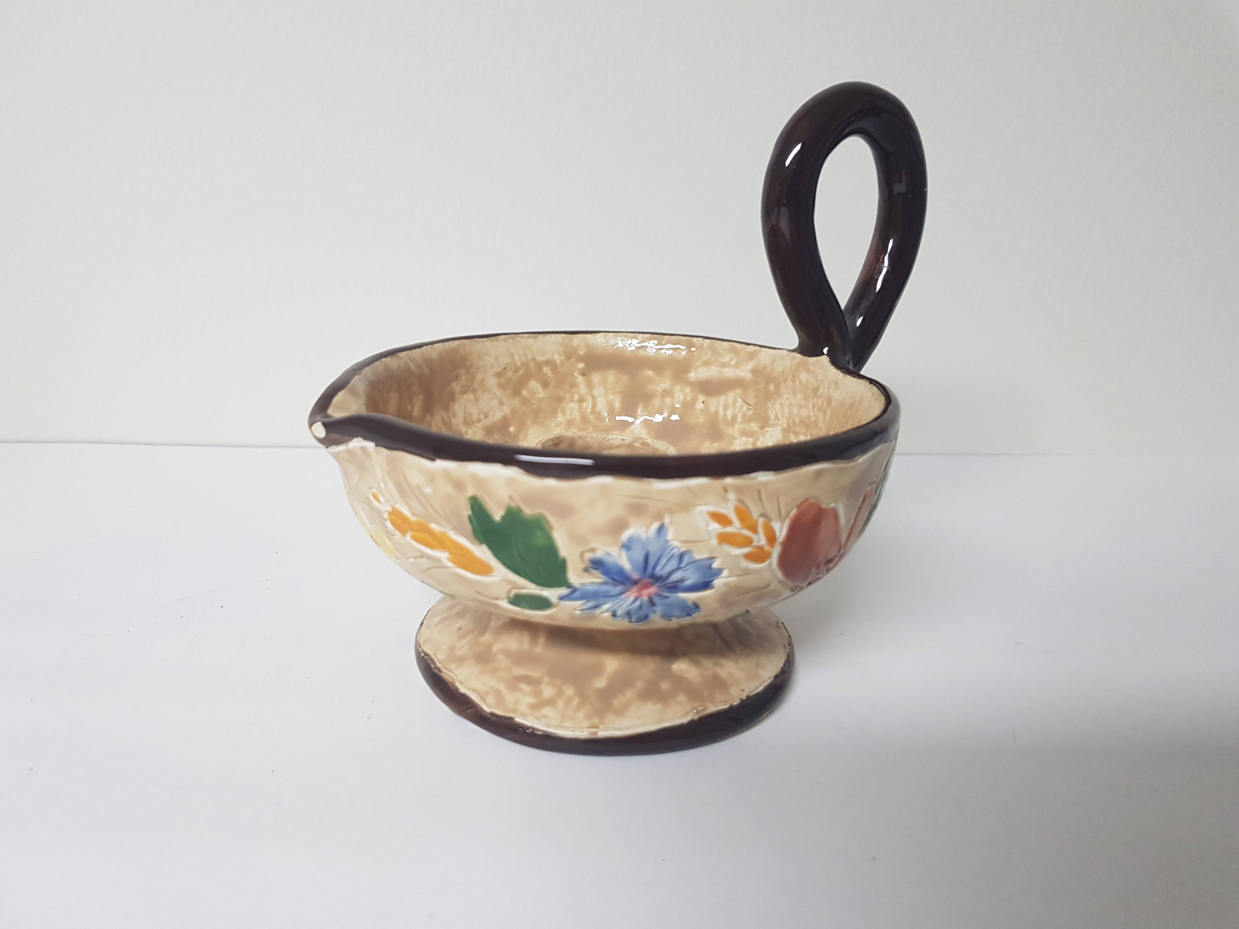 Floral motif ceramic candle holder signed J Massier Vallauris