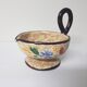 Floral motif ceramic candle holder signed J Massier Vallauris