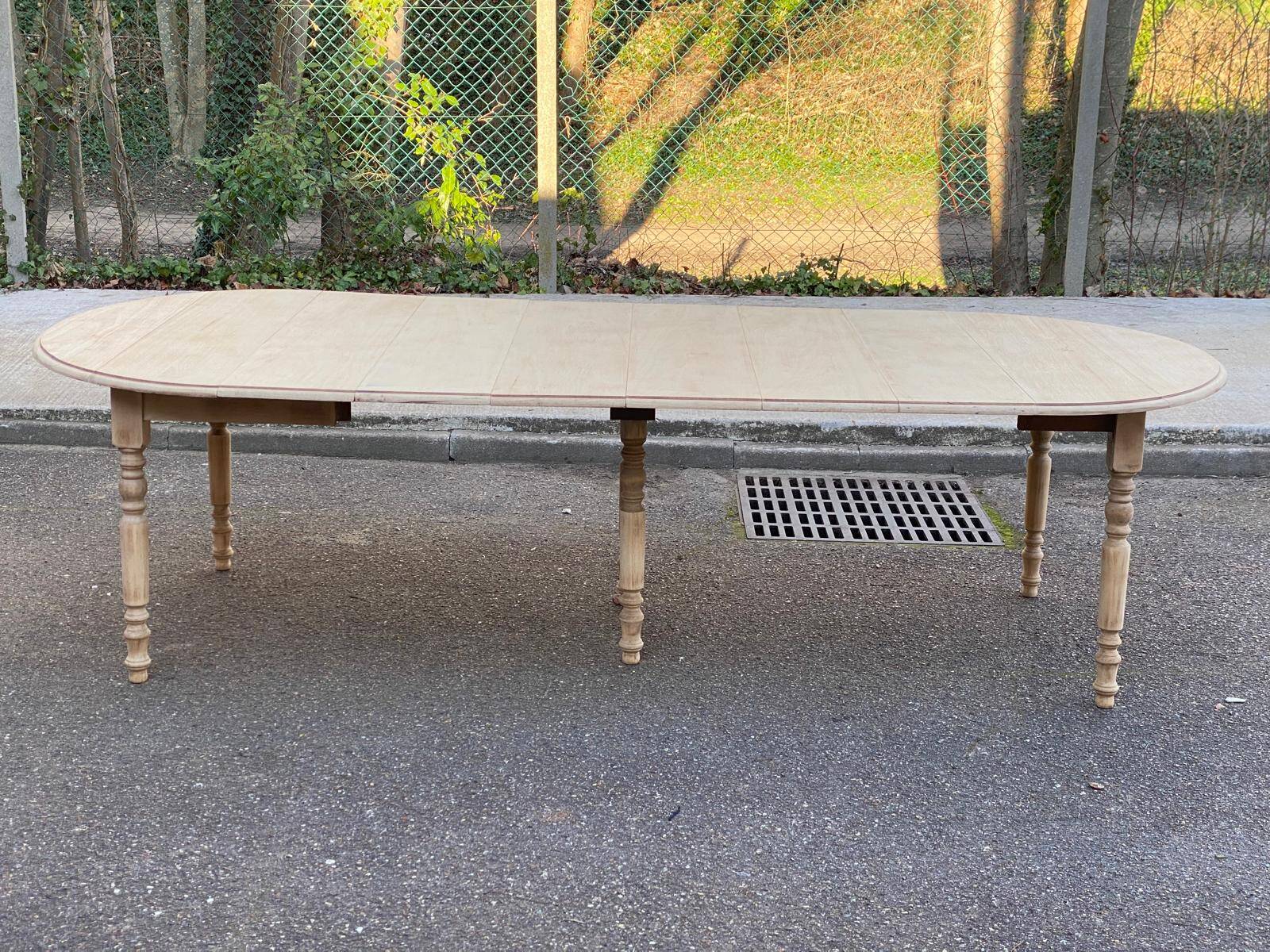 Renovated round extendable dining table with flaps, 6 extensions, 300cm.