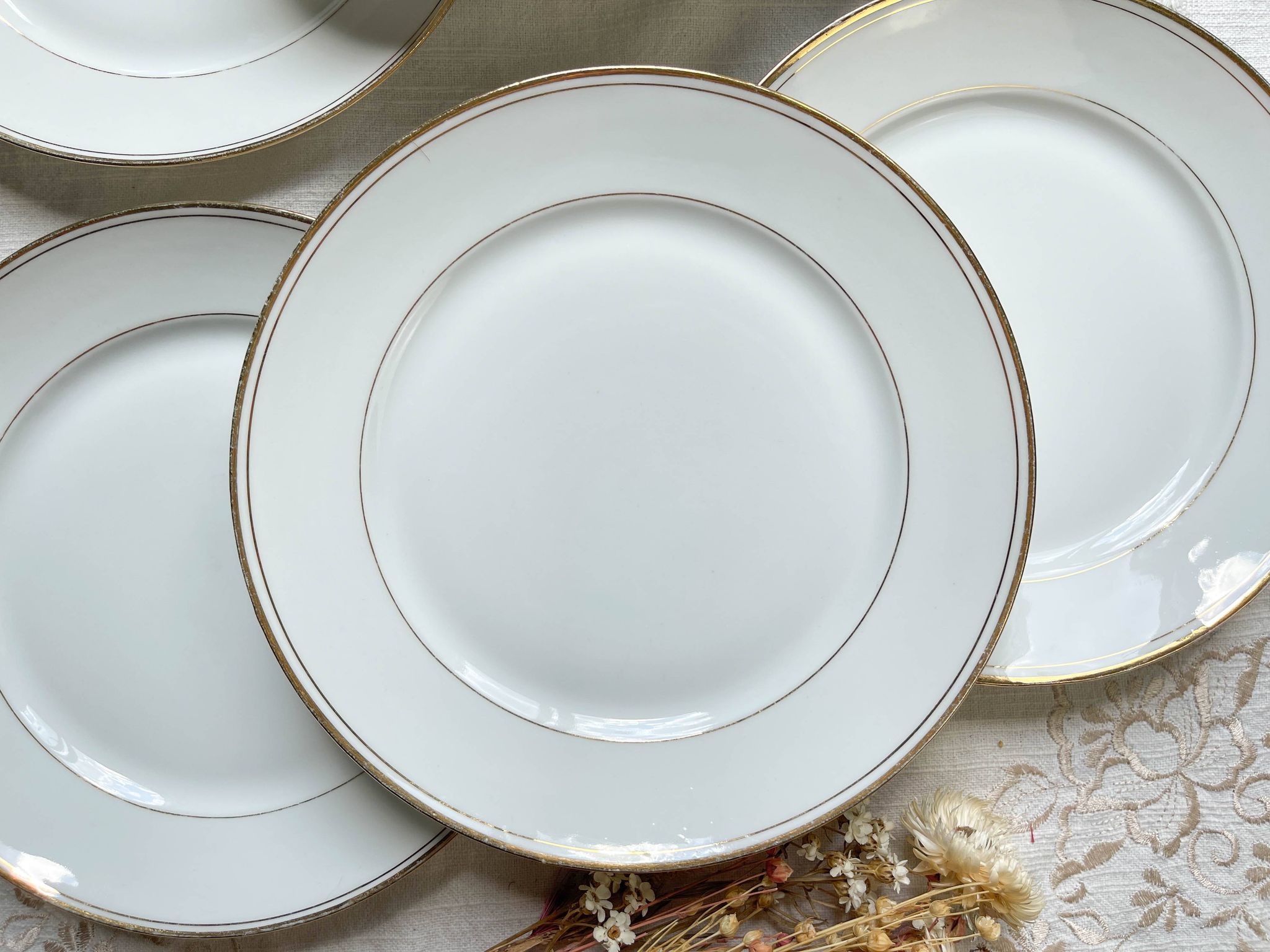 6 Small vintage French plates in golden white Limoges porcelain