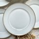 6 Small vintage French plates in golden white Limoges porcelain