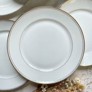 6 Small vintage French plates in golden white Limoges porcelain
