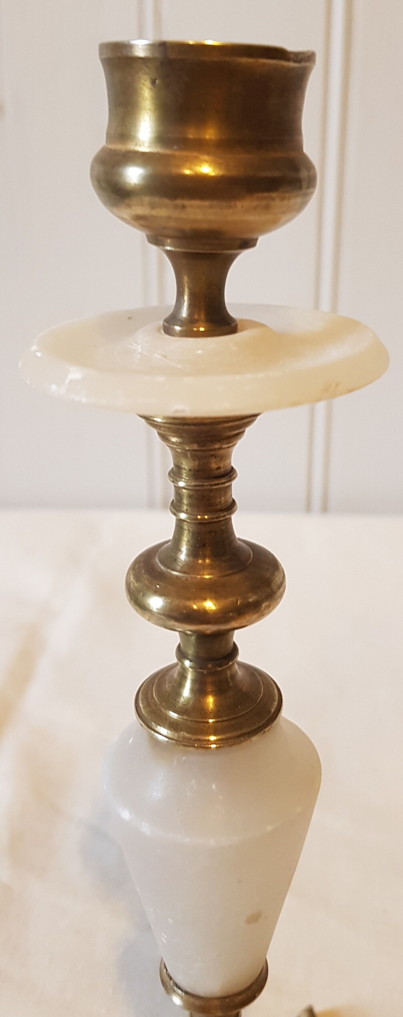Pair of brass and alabaster candlesticks