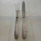 Serving cutlery in silver metal