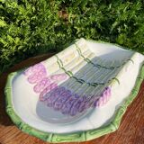 Plate of asparagus with a sauce.