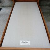 Wooden bed and rattan