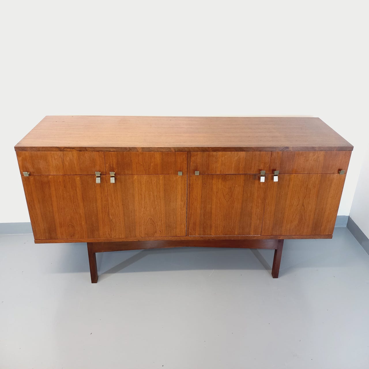 Vintage Scandinavian style row in rosewood and brass from the 60s