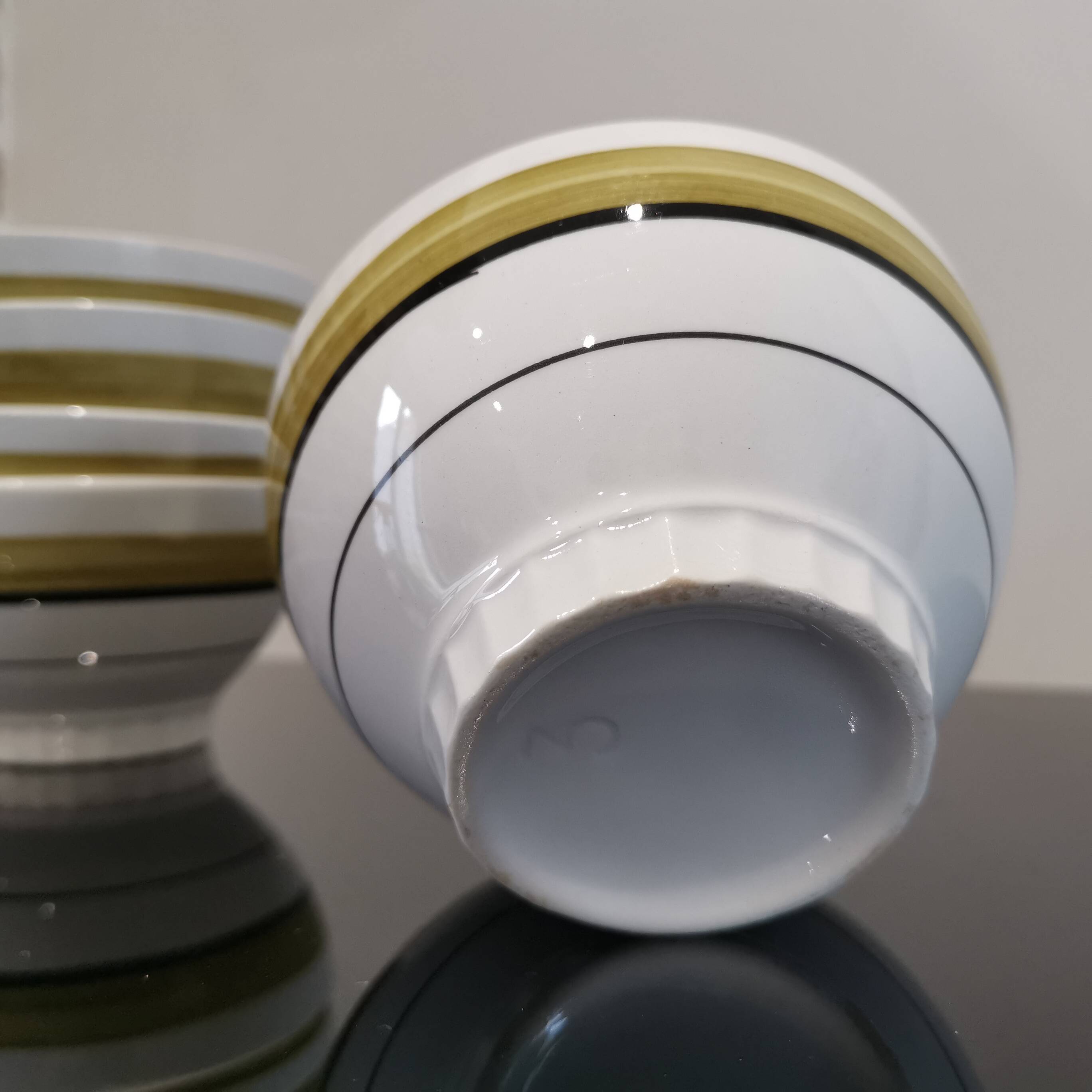 Series of 5 small old earthenware bowls with olive green edging