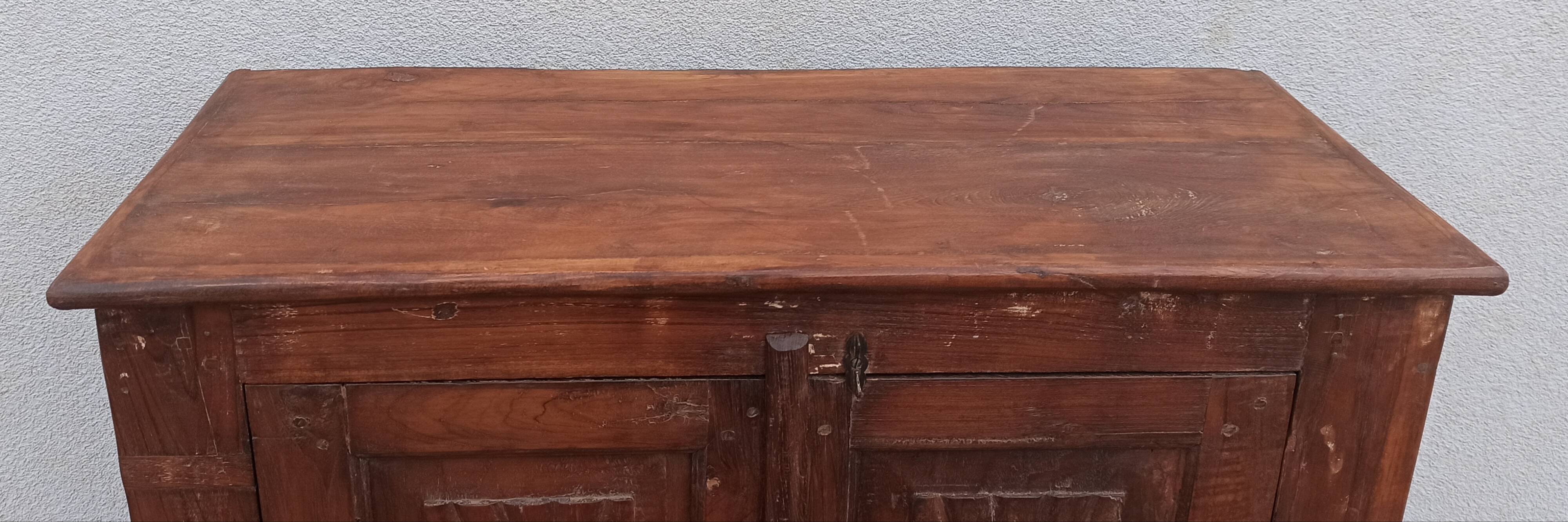 Old wooden cabinet with ceramic handles