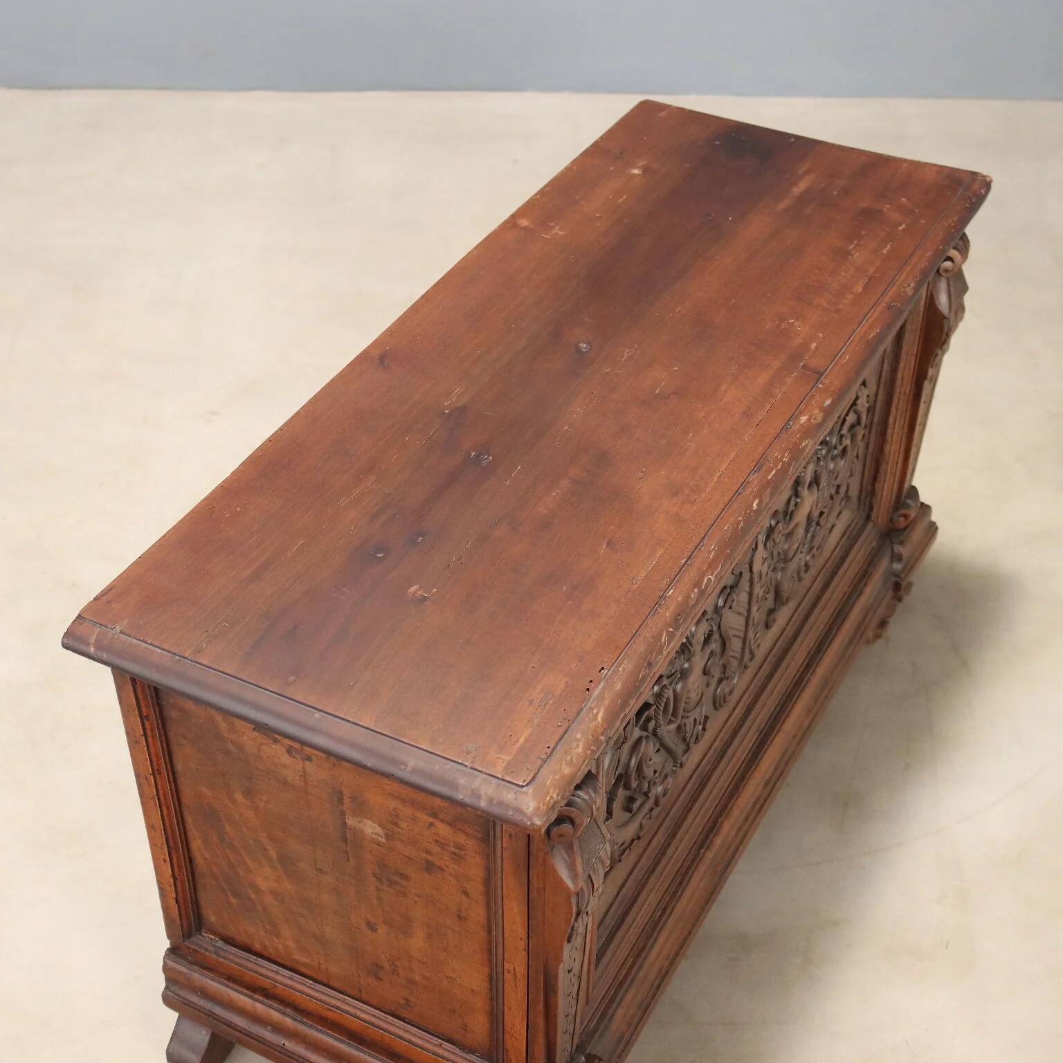 Walnut chest with baroque carvings