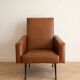 Vintage 1950s brown faux leather armchair