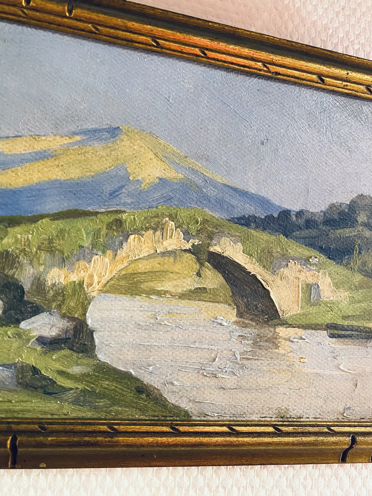 Small oil on panel of a countryside view from the early 20th century.