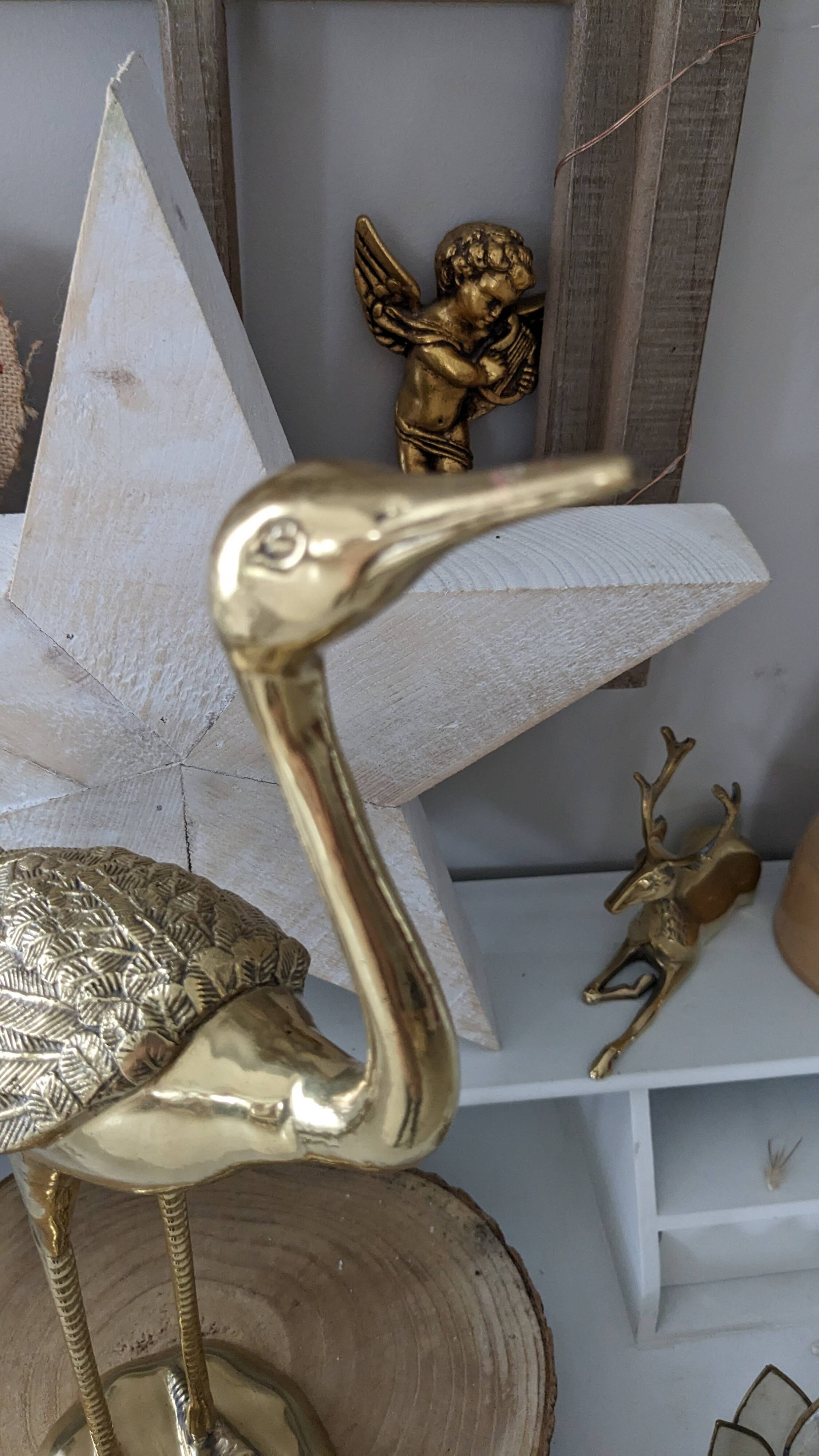 Vintage heron in gilded and solid brass
