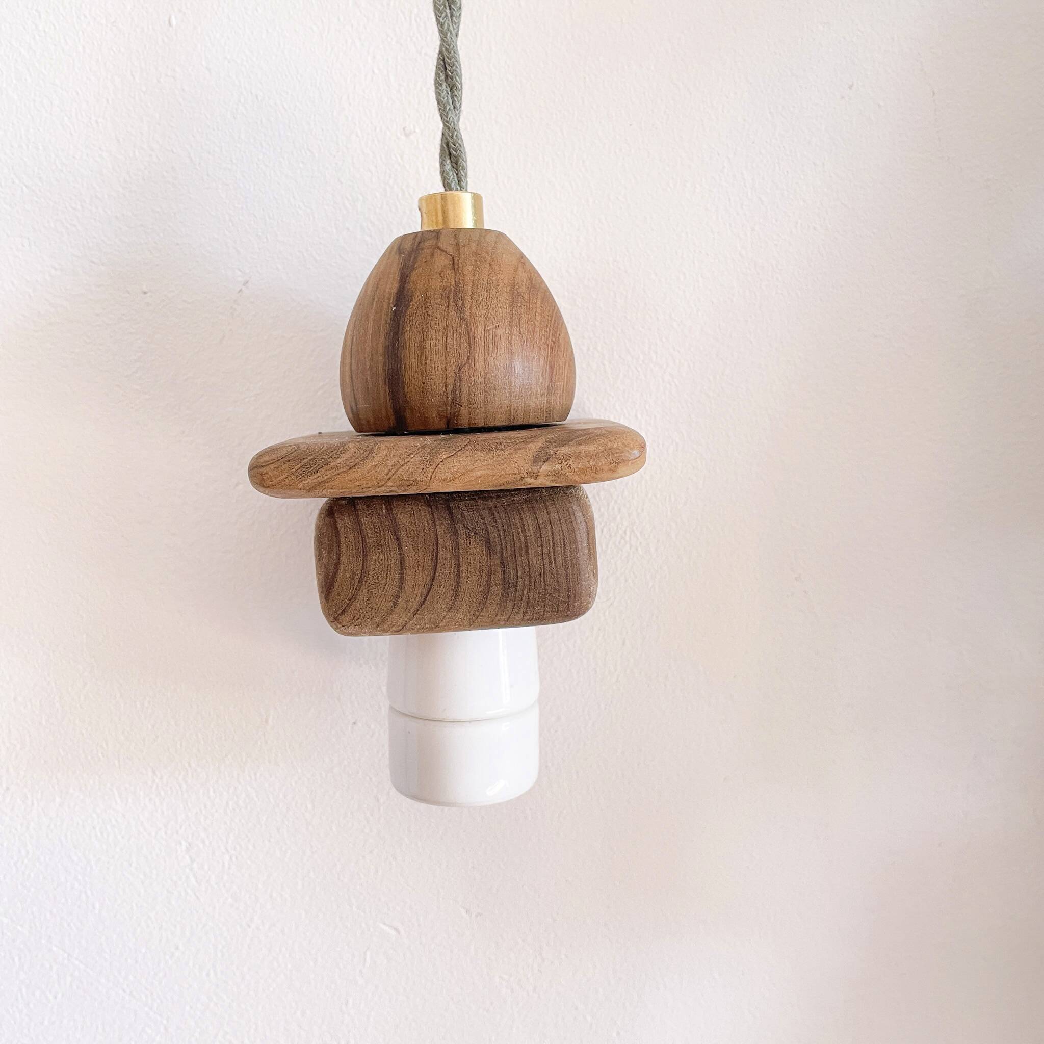 Wooden portable lamp with green cable
