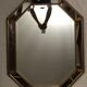 Miroir octogonal en bois doré biseauté  92x71cm