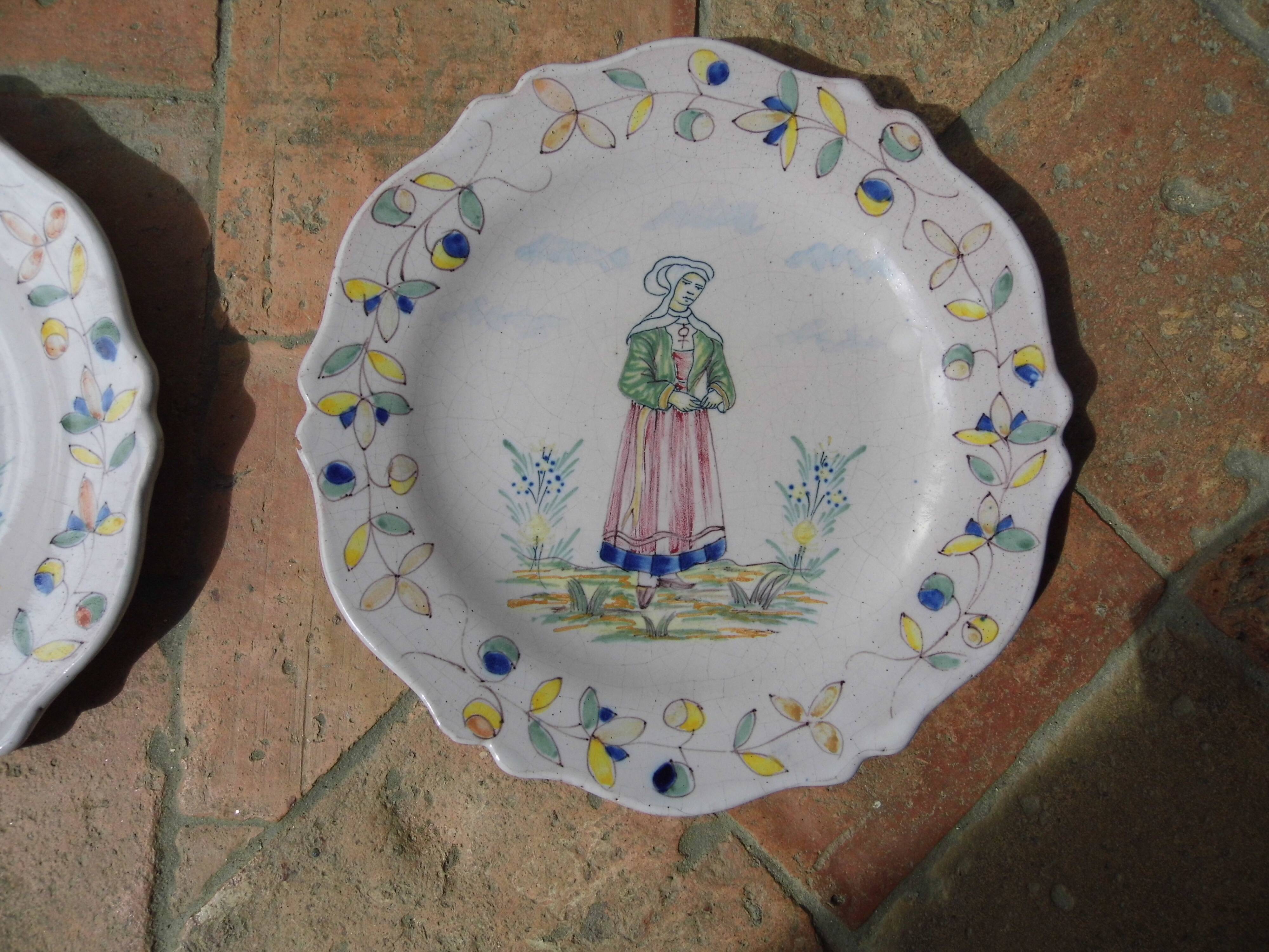 Malicorne earthenware plates, late nineteenth century, Breton décor.
