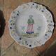 Malicorne earthenware plates, late nineteenth century, Breton décor.