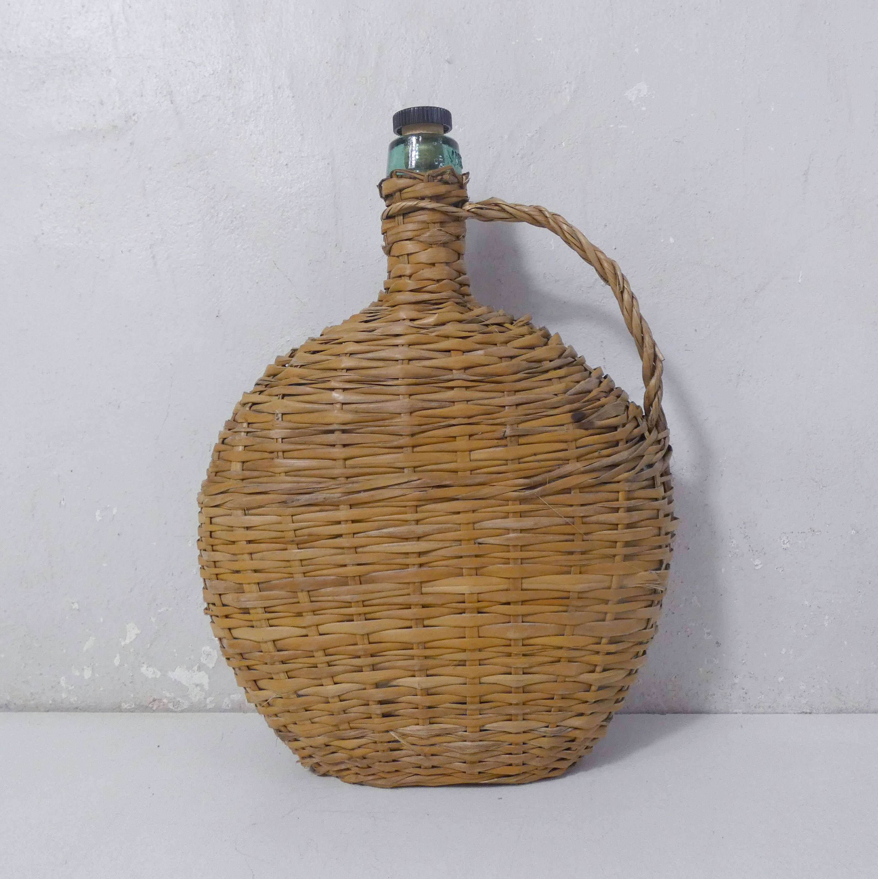 old bottle dressed in rattan vintage pilgrim gourd