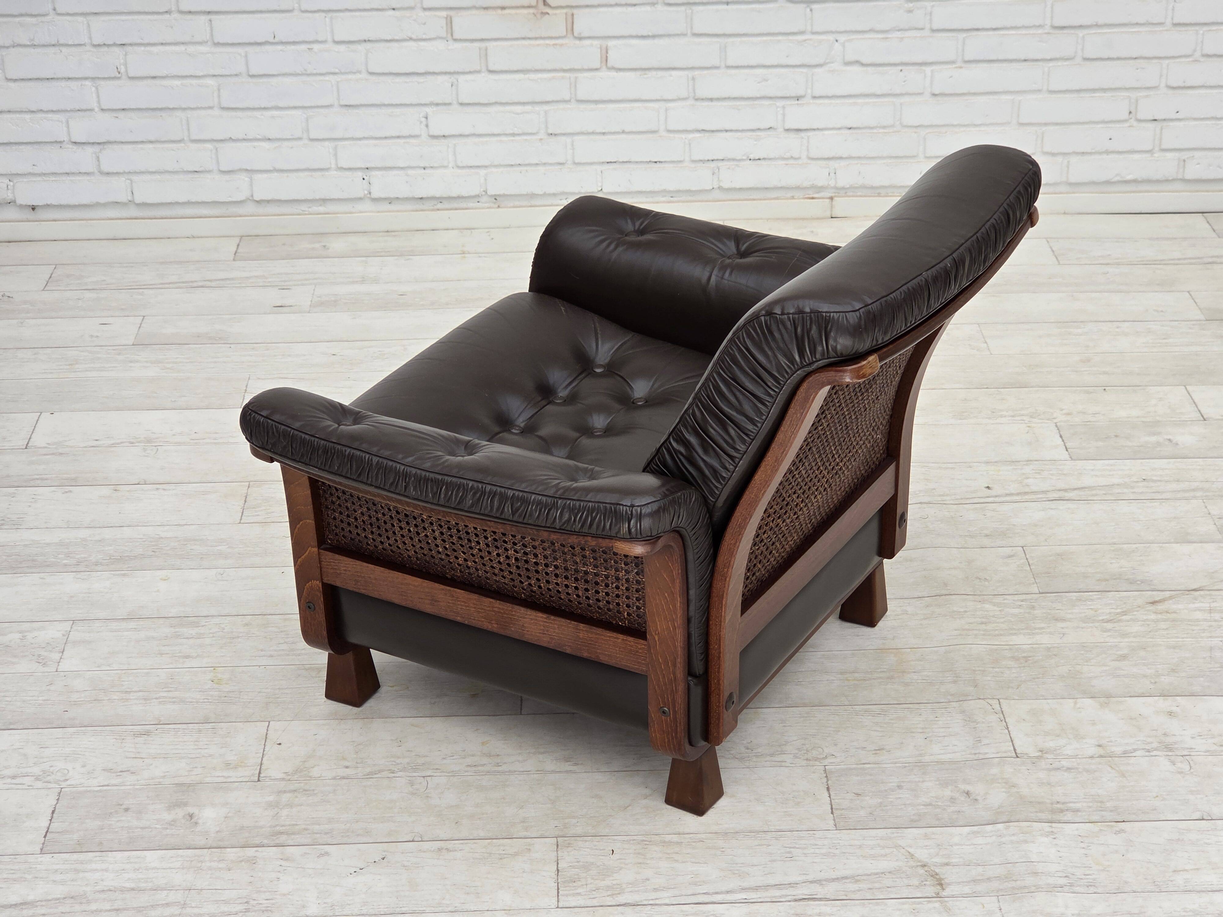 1970s, Scandinavian armchair, brown furniture leather, teak wood legs.