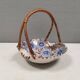 Beautiful small painted ceramic basket with woven handle