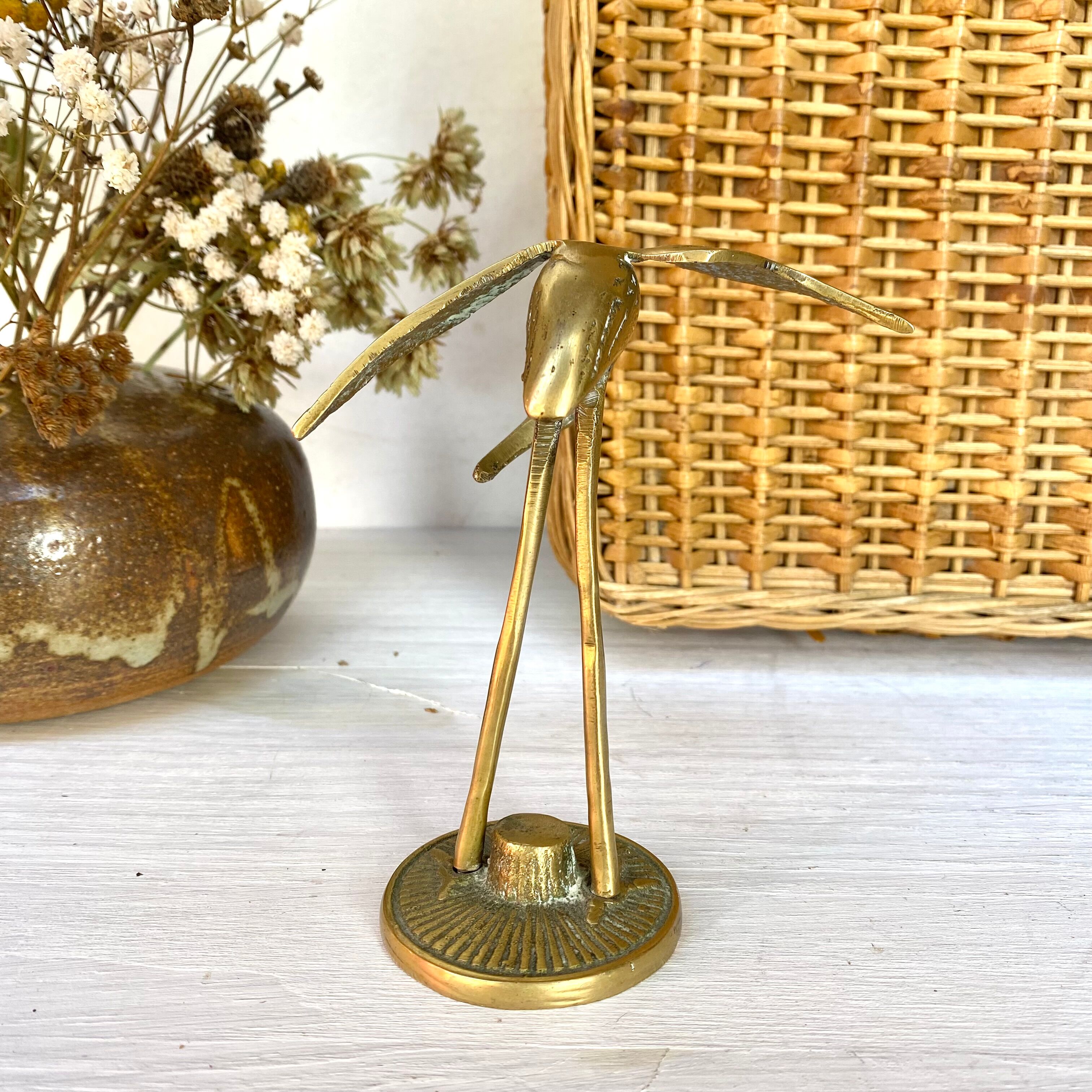 Golden brass bird