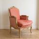 Pair of Louis XV cabriolet armchairs in wood and pink fabric.