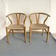 2 dining chairs in teak and rope
