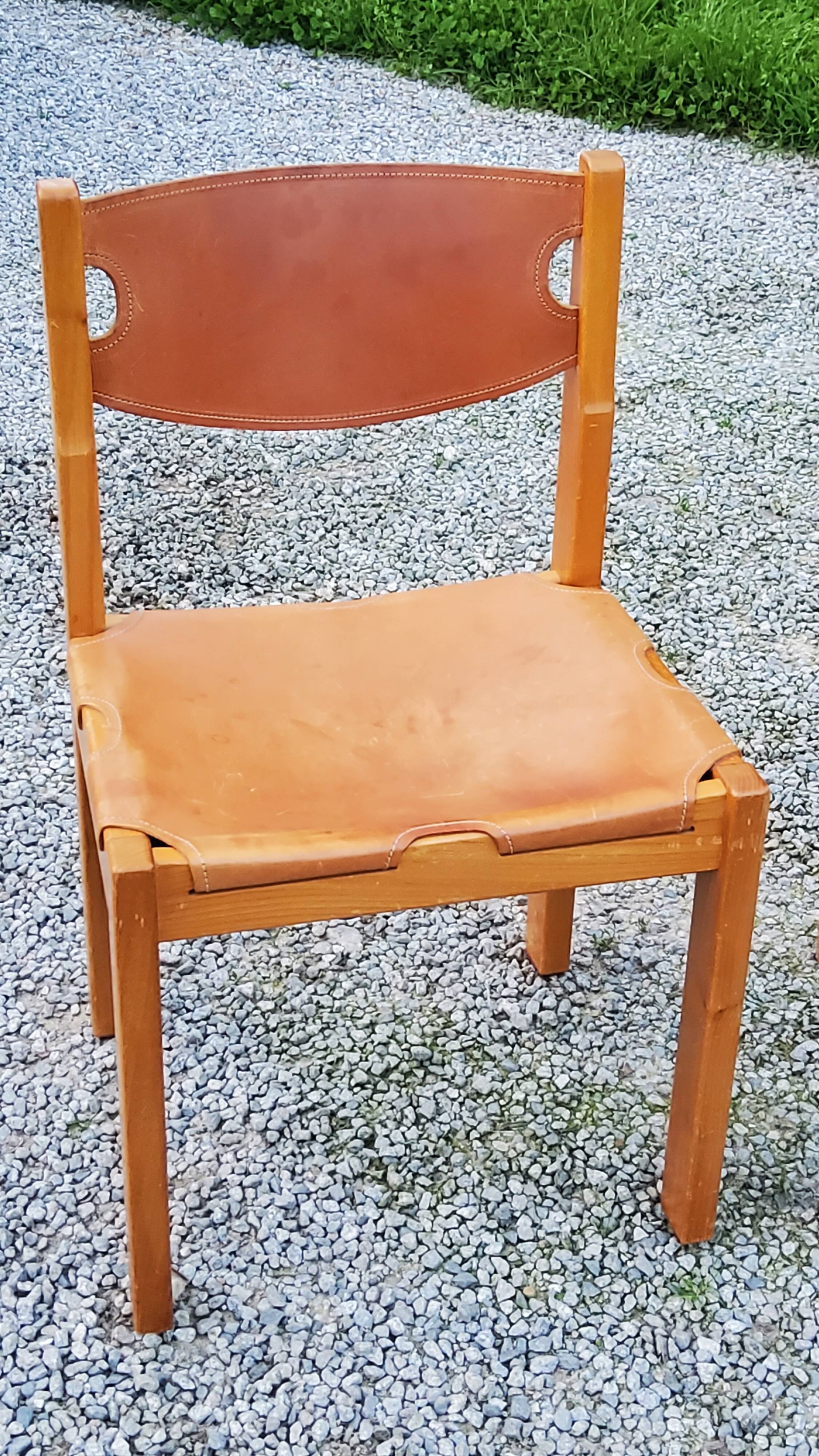 Pair of brutalist chairs in elm and stretched leather with saddle stitching Self publisher