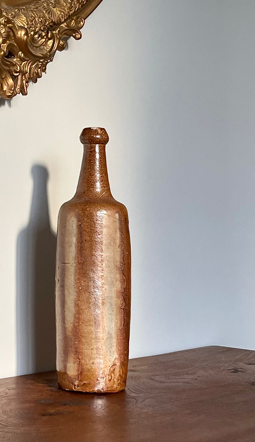 Antique stoneware bottle, 19th century.