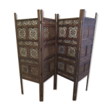 Former screen in treated exotic wood