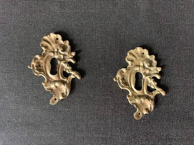 Pair of rocaille bronze keyholes from the 19th century