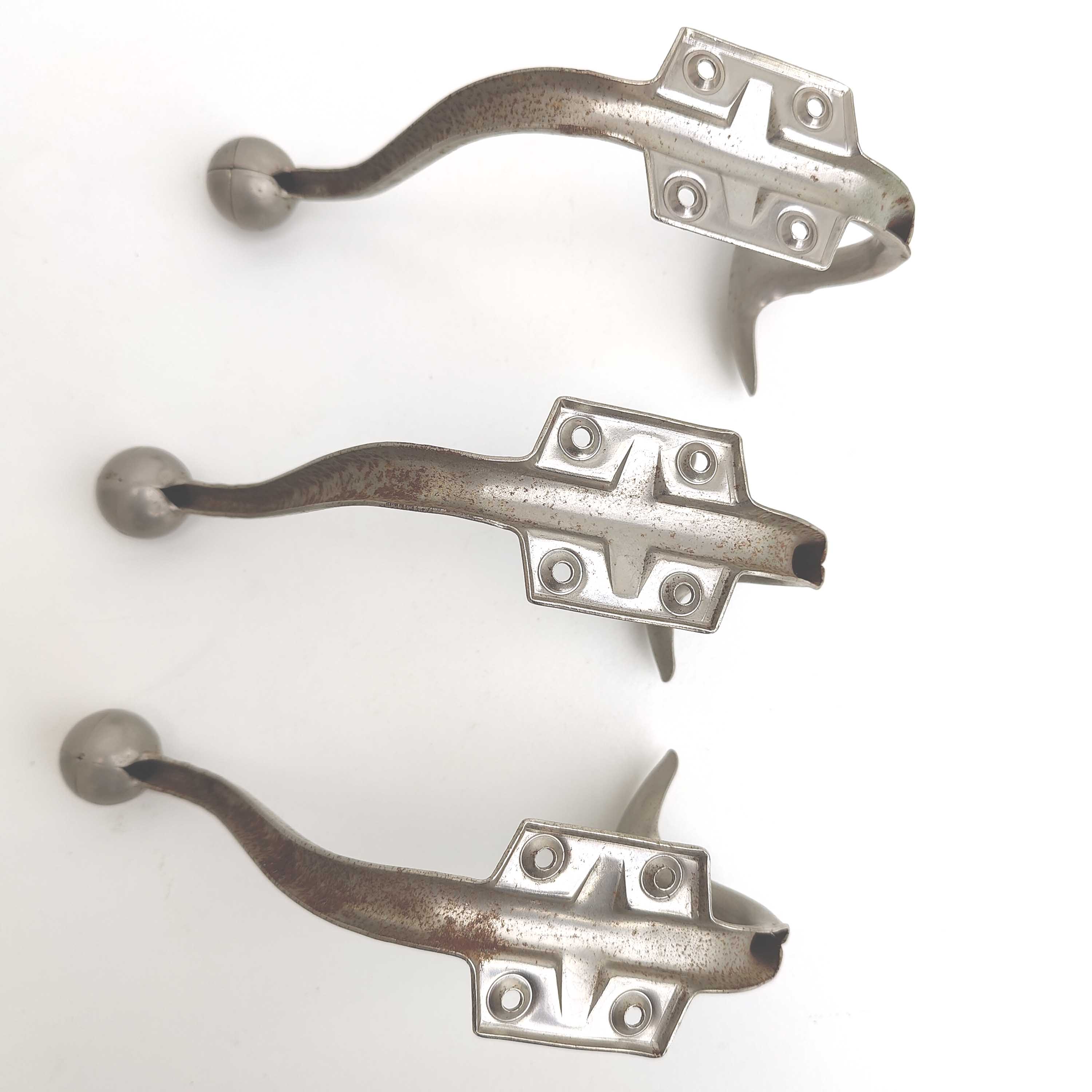 Three metal hooks