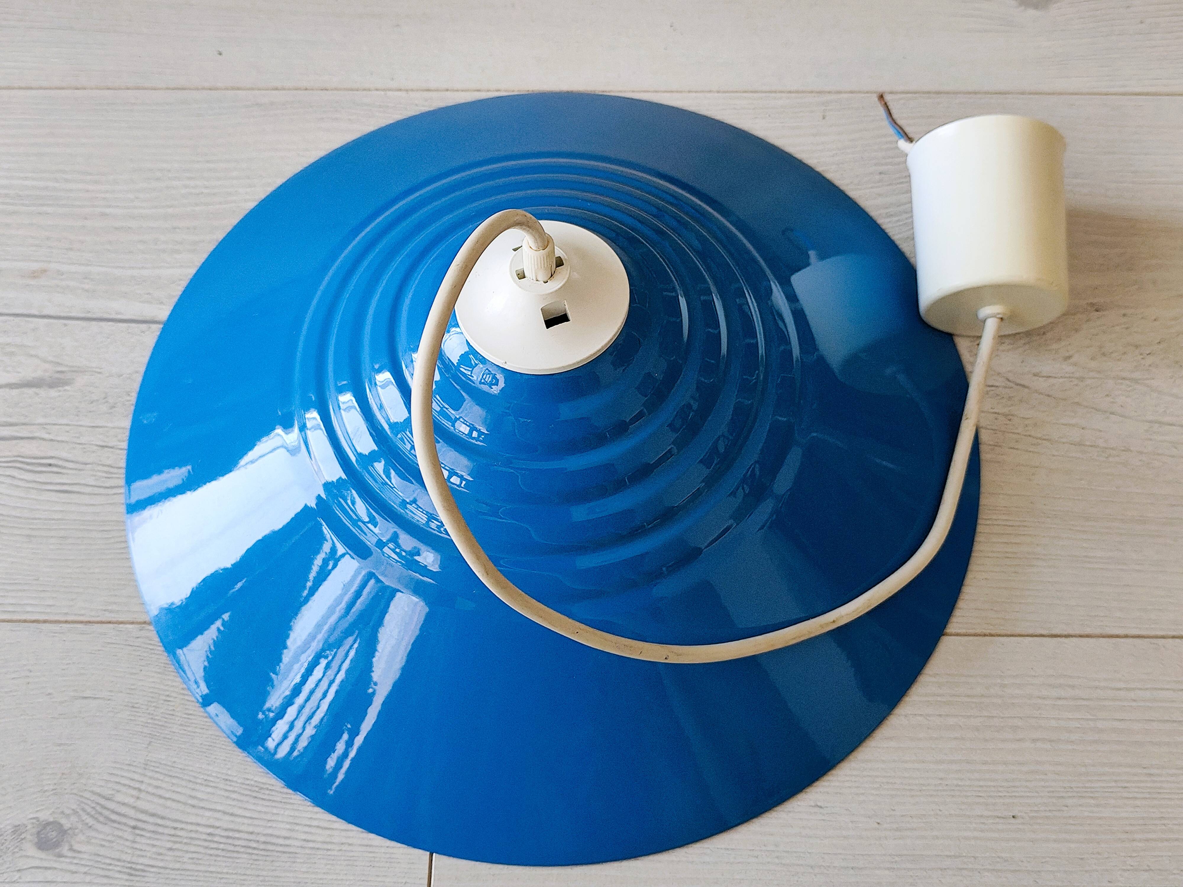 Blue lacquered metal suspension in a 70s/80s style.