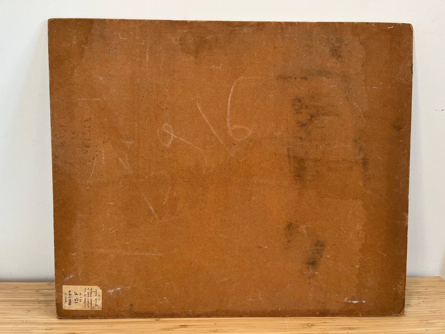 Castle in the rooftops, oil on wood panel, signed JA Dompierre.