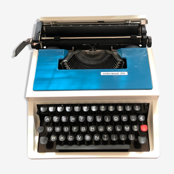 Blue portable Underwood 315 typewriter