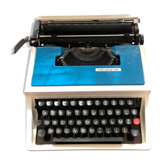 Blue portable Underwood 315 typewriter