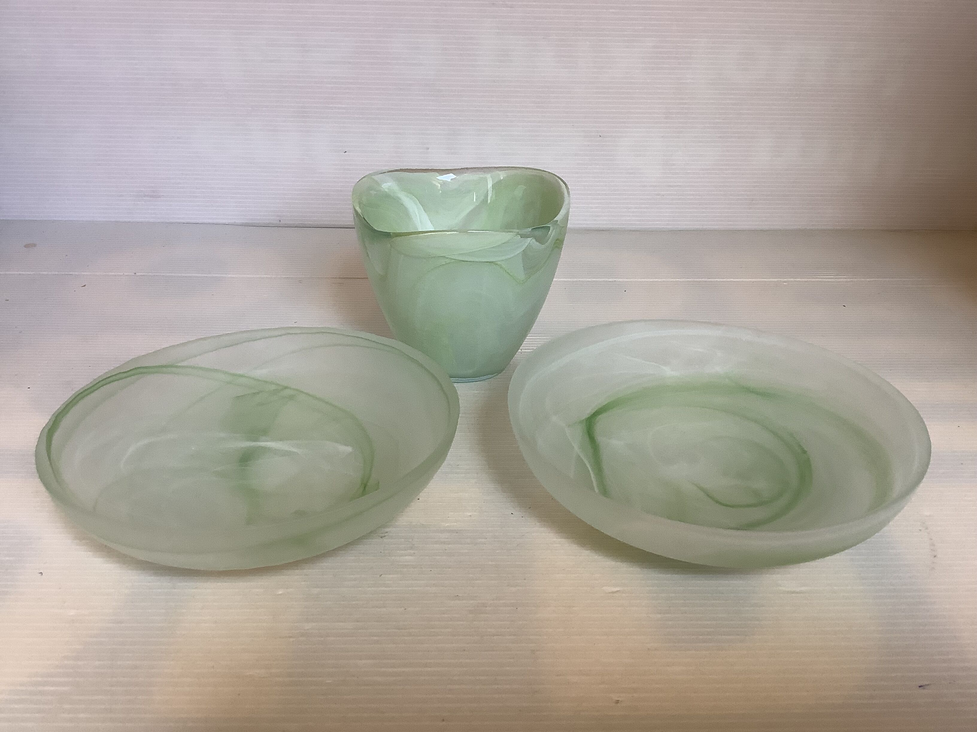 Trio of empty pockets bag makers green glass paste